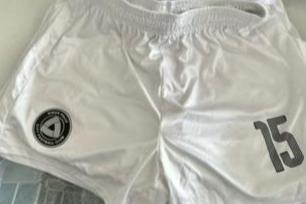 RETIRED - and GAME WORN - white, black or orange shorts 2022-2023